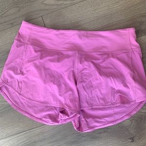 Speed up shorts mid rise , size 10, 4 inch inseam